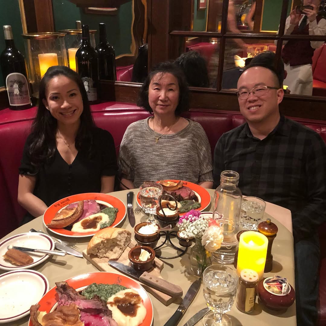 Marilyn at a family dinner with her son and daughter-in-law.